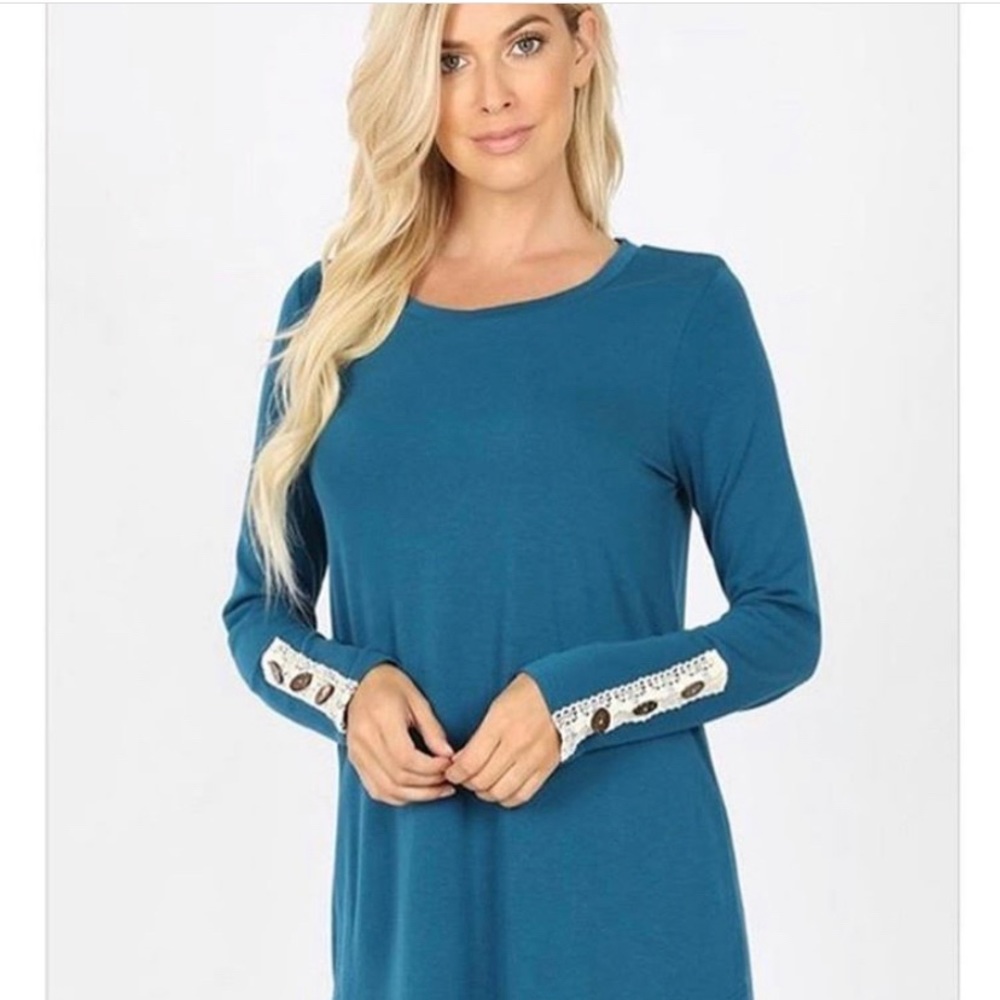 Boutique long sleeved dark teal top